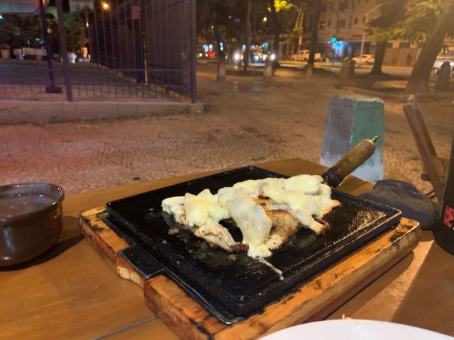 A grilled plate of chicken at a streetside restaurant in Rio de Janeiro