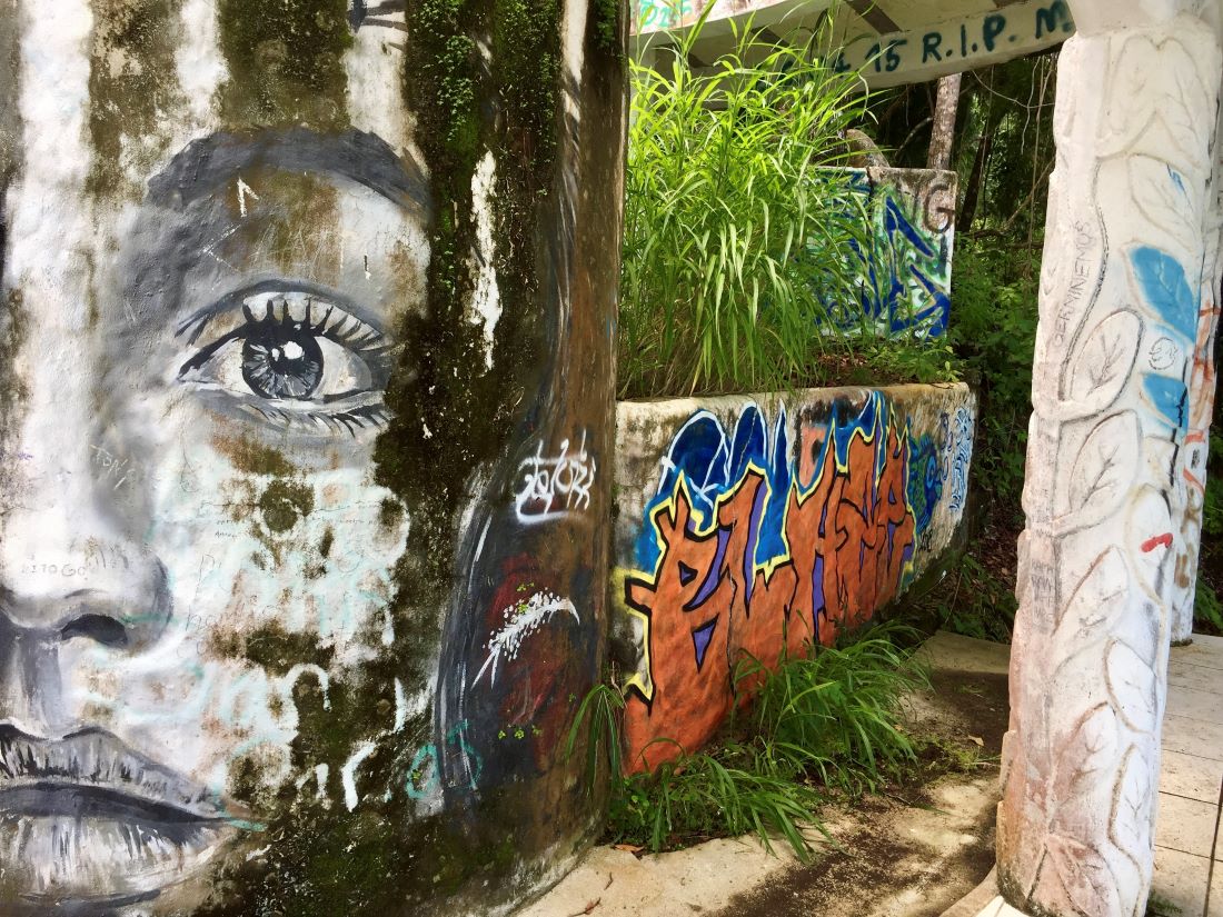 Amazing graffiti of a face on the wall of an abandoned house in Costa Rica