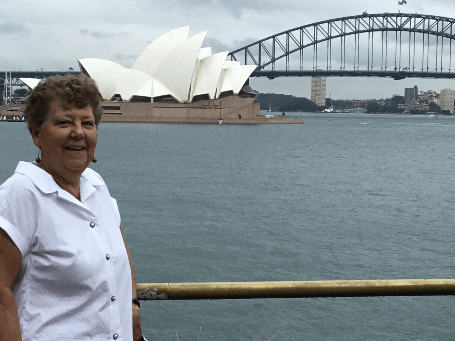Deborah Graves in Sydney, Australia with the Sydney Opera House in the background