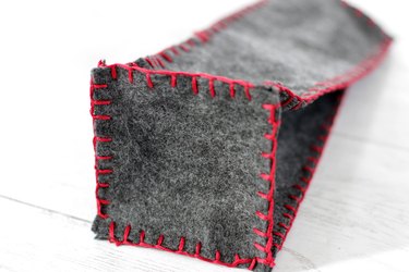 use a blanket stitch to attach square to bottom
