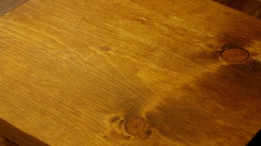 Pine board stained with instant coffee.