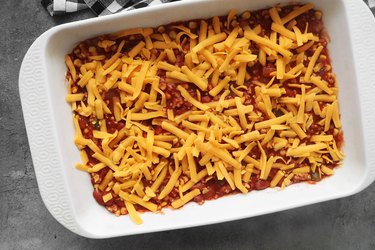 Add chili and cheese to casserole dish