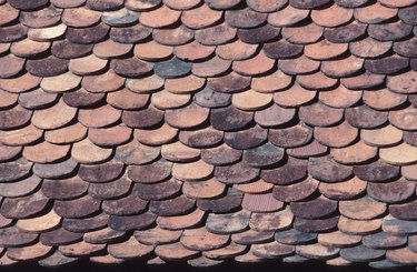 Overlapping roof tiles on building