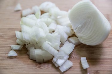 chopped onion on a cutting board