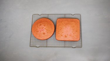 Round and square cake on cooling rack