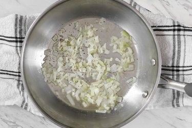 Cook onion in butter