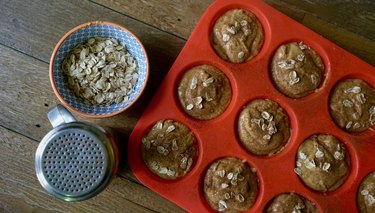 Pumpkin oat blender muffins topped with oats and cinnamon