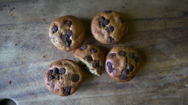 Fresh-baked peanut butter banana blender muffins topped with chocolate chips