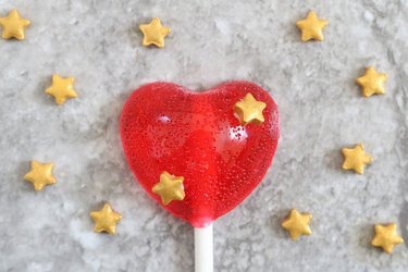 Emoji heart lollipop