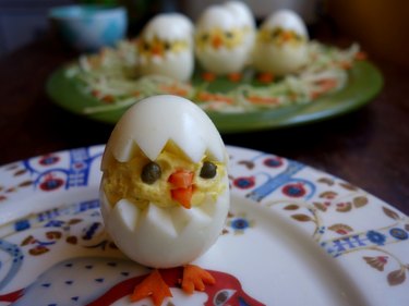 Deviled egg Easter chick on plate.