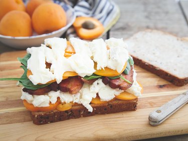 Assembling apricot brie and bacon grilled cheese
