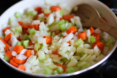 onion, carrot, and celery in a skillet