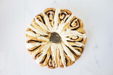 Cinnamon Roll Wreath drizzled with the cream cheese glaze.